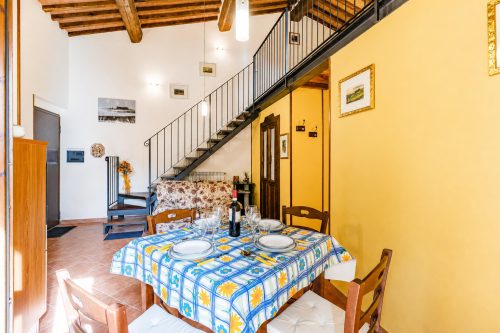 Tuscan Sun Duplex with Balcony and Shared Pool