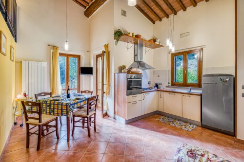 Tuscan Sun Duplex with Balcony and Shared Pool