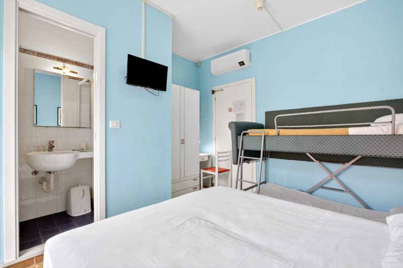 Room With Double Bed And Bunk Bed