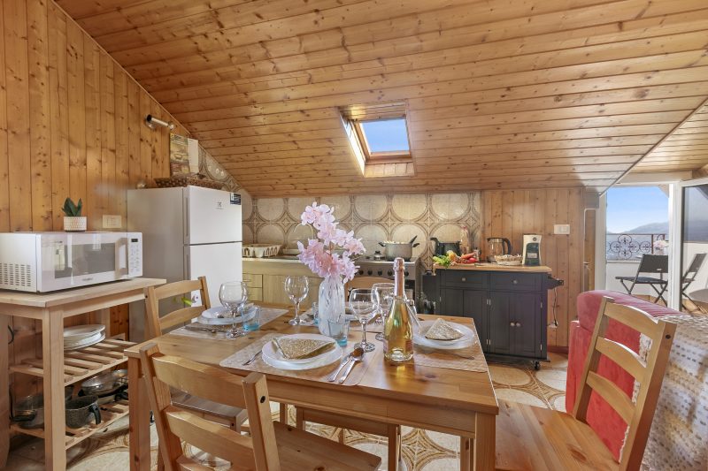 La Mansarda Sul Lago: Rustic Attic Studio with Balcony & Parking