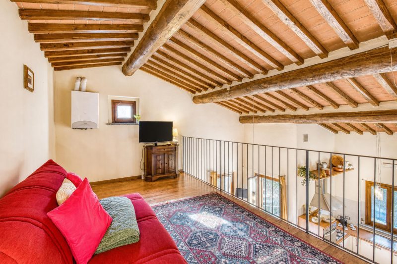 Tuscan Sun Duplex with Balcony and Shared Pool