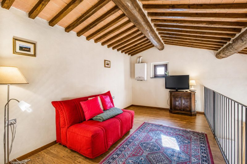 Tuscan Sun Duplex with Balcony and Shared Pool
