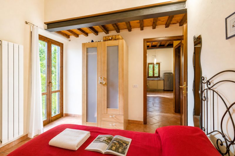 Tuscan Sun Duplex with Balcony and Shared Pool