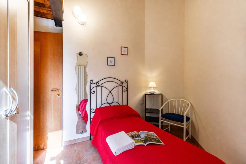 Tuscan Sun Duplex with Balcony and Shared Pool