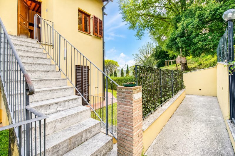 Tuscan Sun Duplex with Balcony and Shared Pool