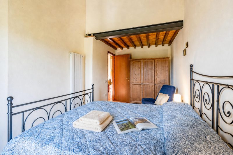 Tuscan Sun Duplex with Balcony and Shared Pool