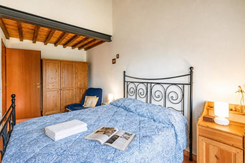 Tuscan Sun Duplex with Balcony and Shared Pool