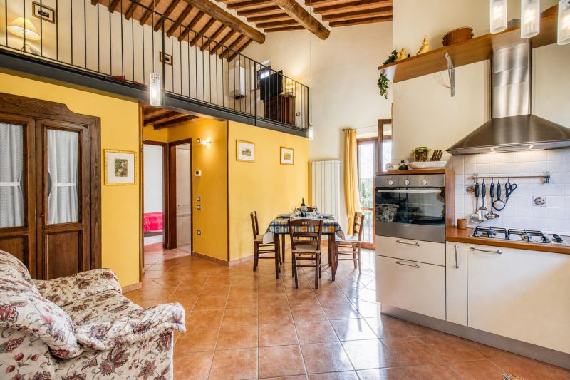 Tuscan Sun Duplex with Balcony and Shared Pool