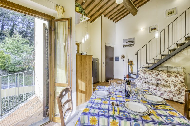 Tuscan Sun Duplex with Balcony and Shared Pool