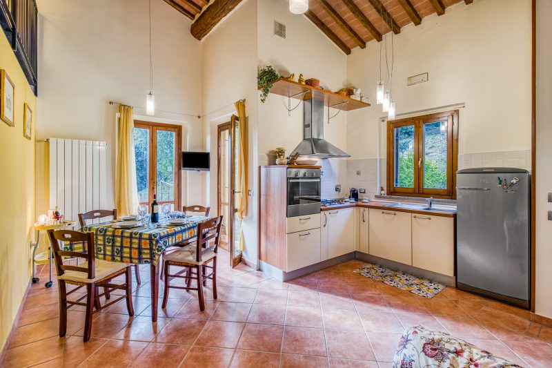 Tuscan Sun Duplex with Balcony and Shared Pool