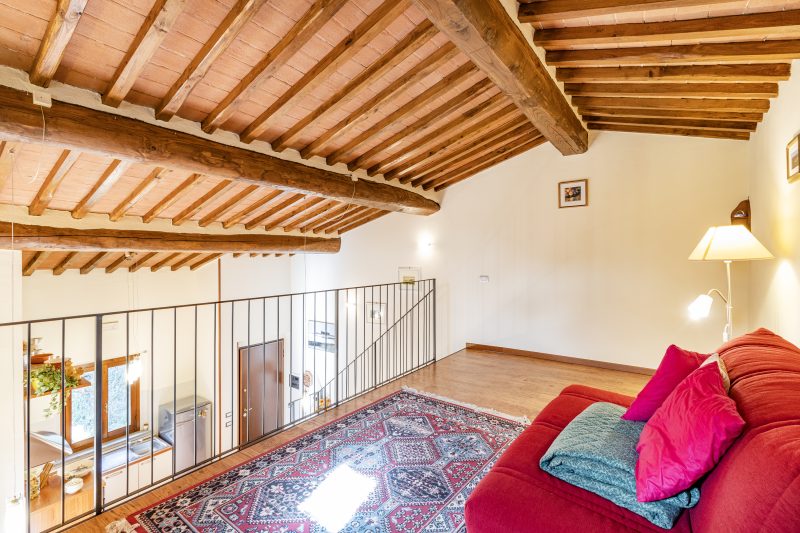 Tuscan Sun Duplex with Balcony and Shared Pool